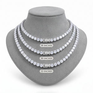 Set of three diamond tennis necklaces on a gray stand with measurement labels. J. Collins Jewelry 