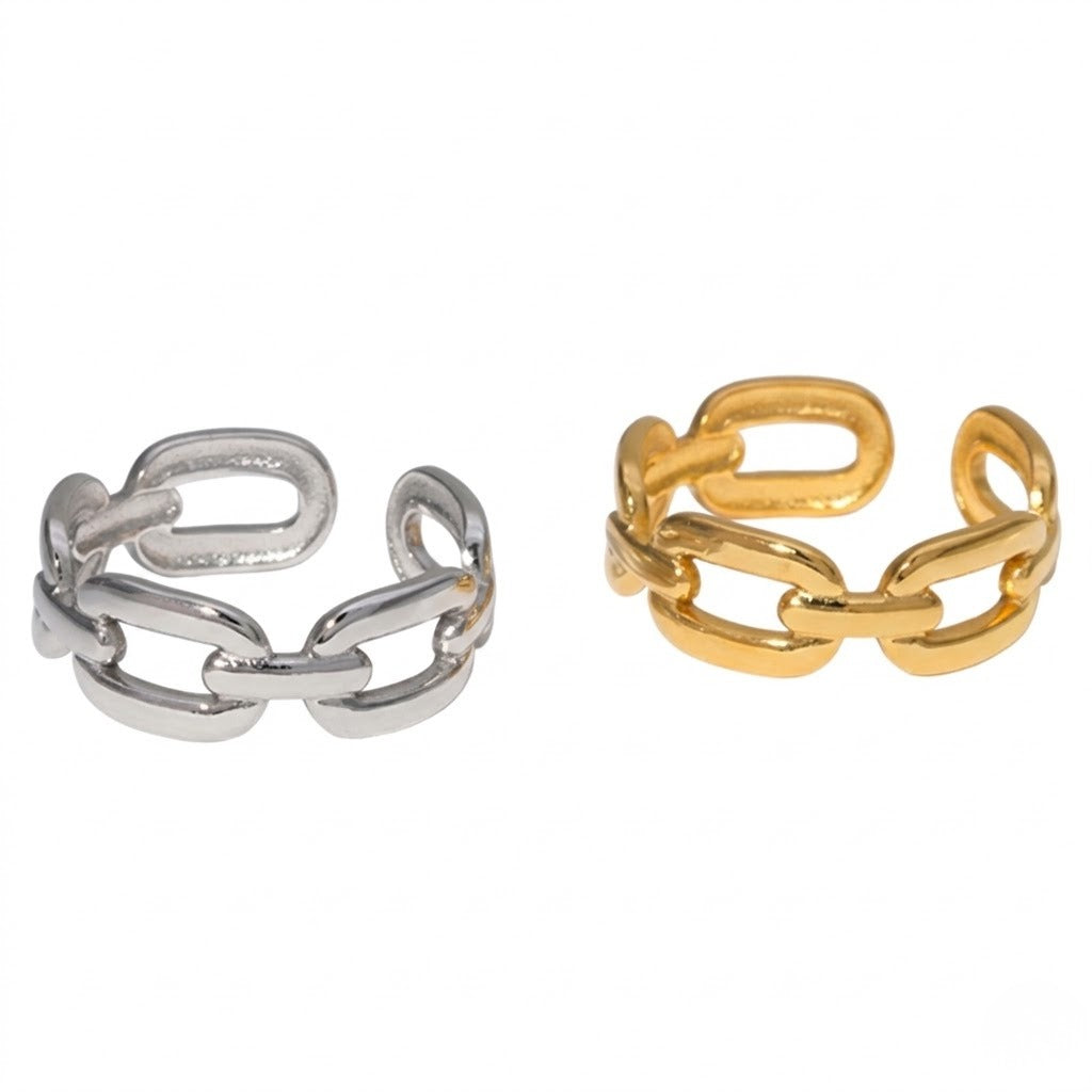 Two chunky chain-link open rings, one in polished silver and one in polished yellow gold, displayed side-by-side on a plain white background - J.Collins Jewelry