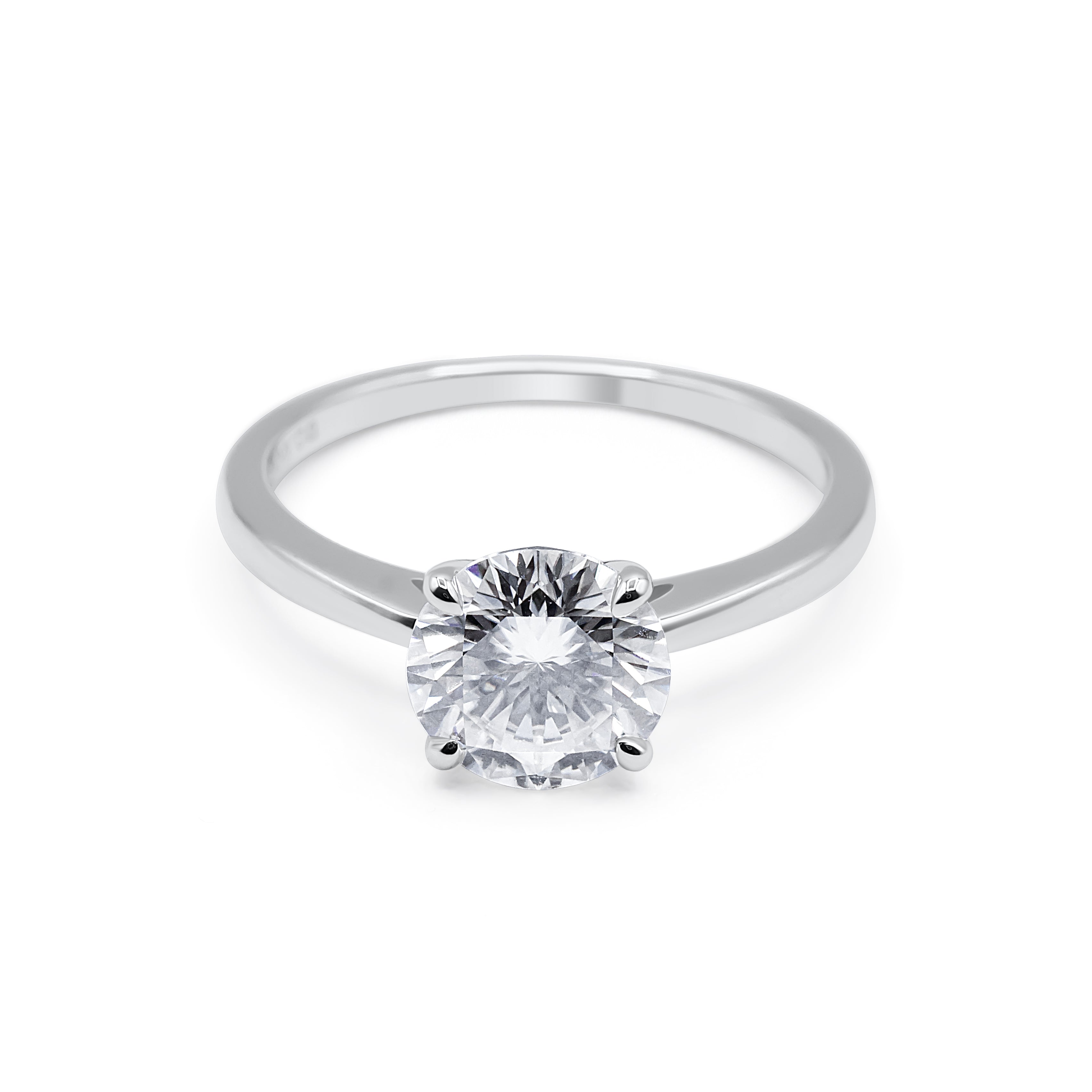 Silver ring with a diamond on a white background-Vow-Ring-JCollins