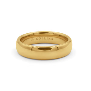 The Dynasty 6mm (Gold) ring with 'J. Collins' engraving on a white background