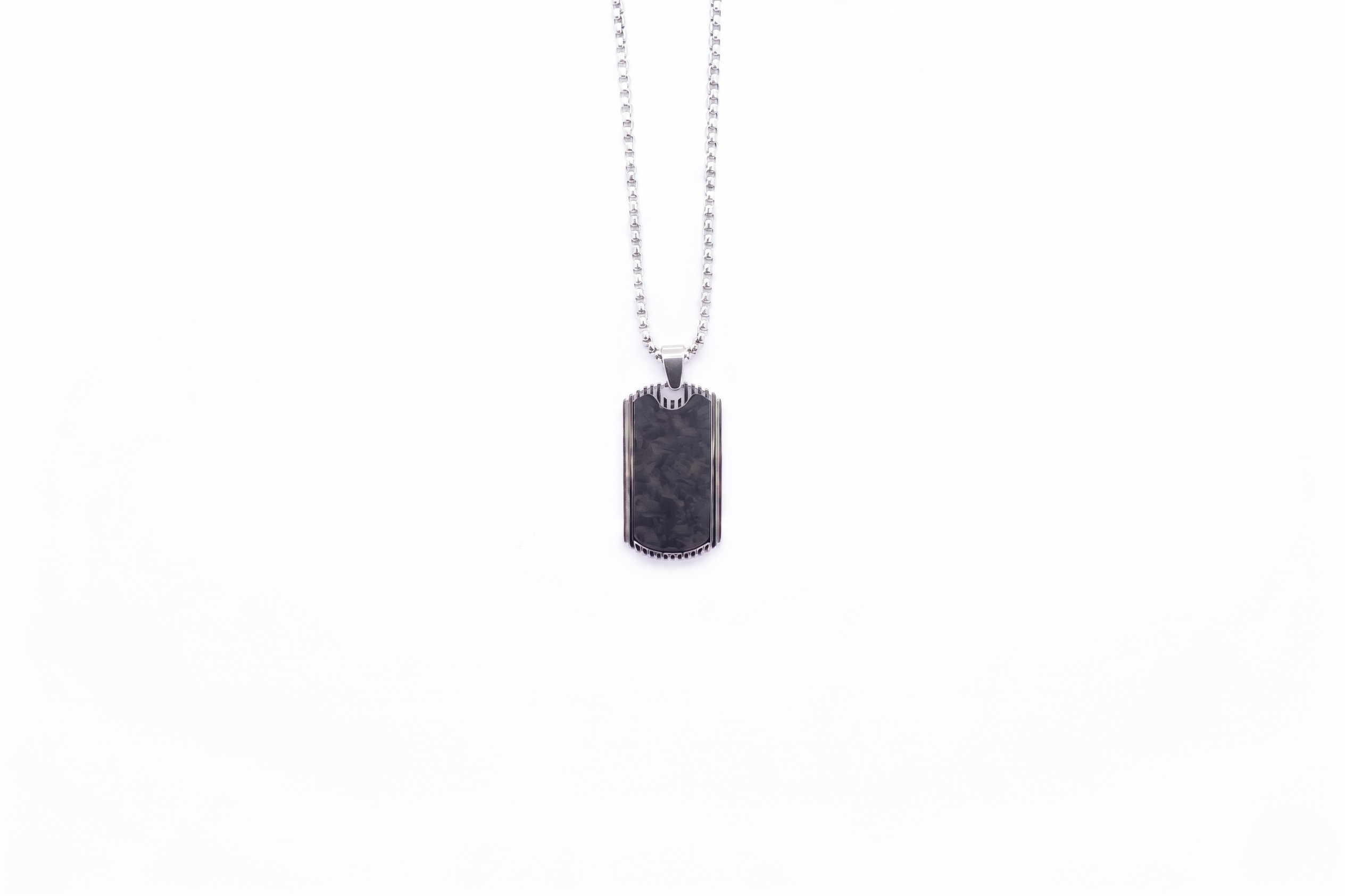 Black dog tag pendant on a chain against a white background-J.Collins Jewelry