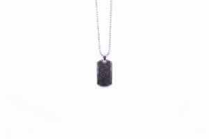 Black dog tag pendant on a chain against a white background-J.Collins Jewelry