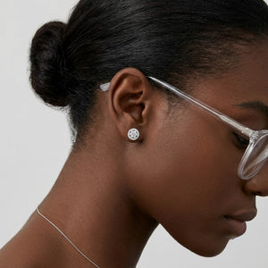 Woman wearing silver pavé cluster stud earrings with delicate chain necklace - J.Collins Jewelry
