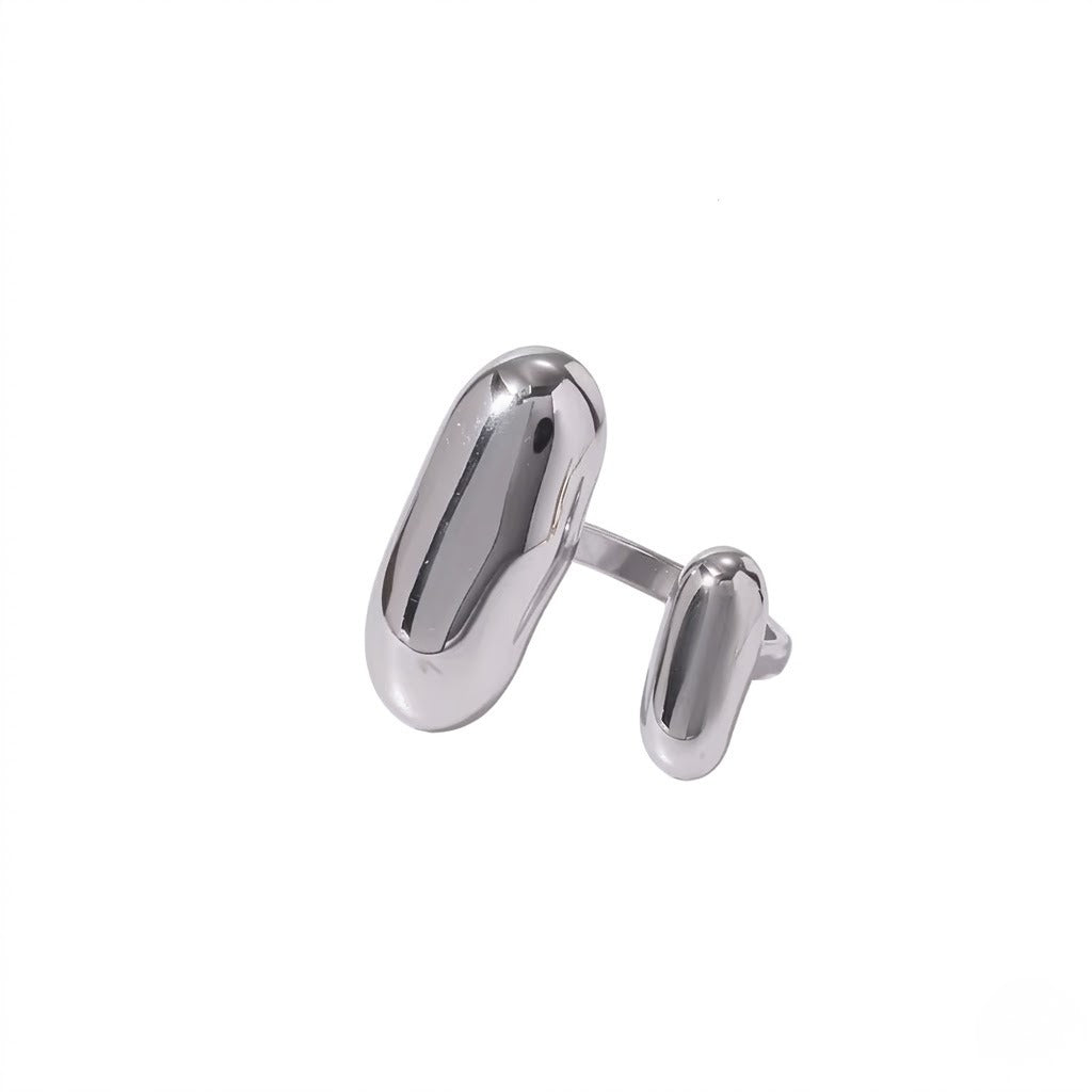 A Silver open ring with two rounded, capsule-like ends, shown on a plain white background - J.Collins Jewelry