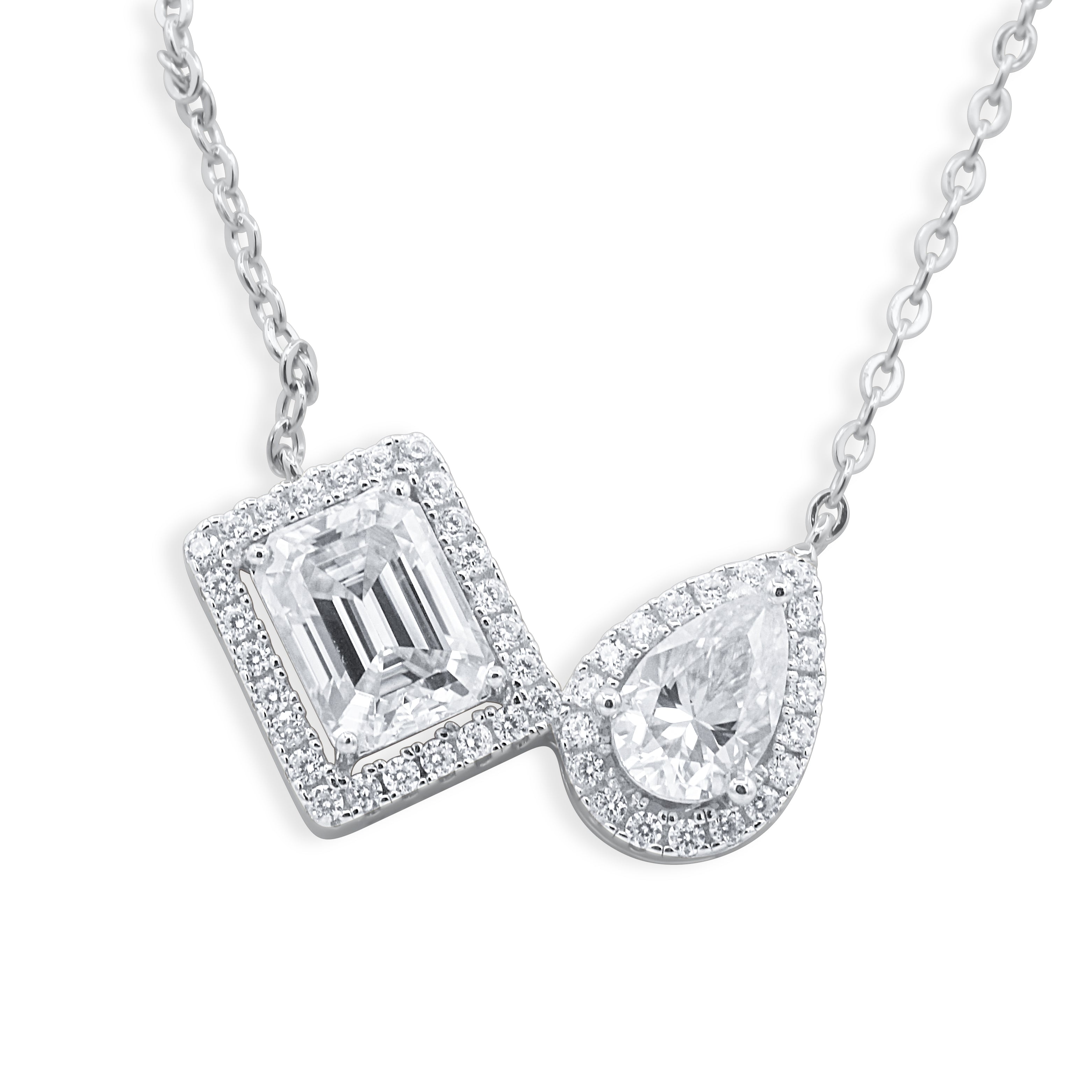 Gold Toi et Moi Emerald-Cut and Pear-Cut Diamond Double Halo Pendant Necklace Close-Up on White Background - J. Collins Jewelry 