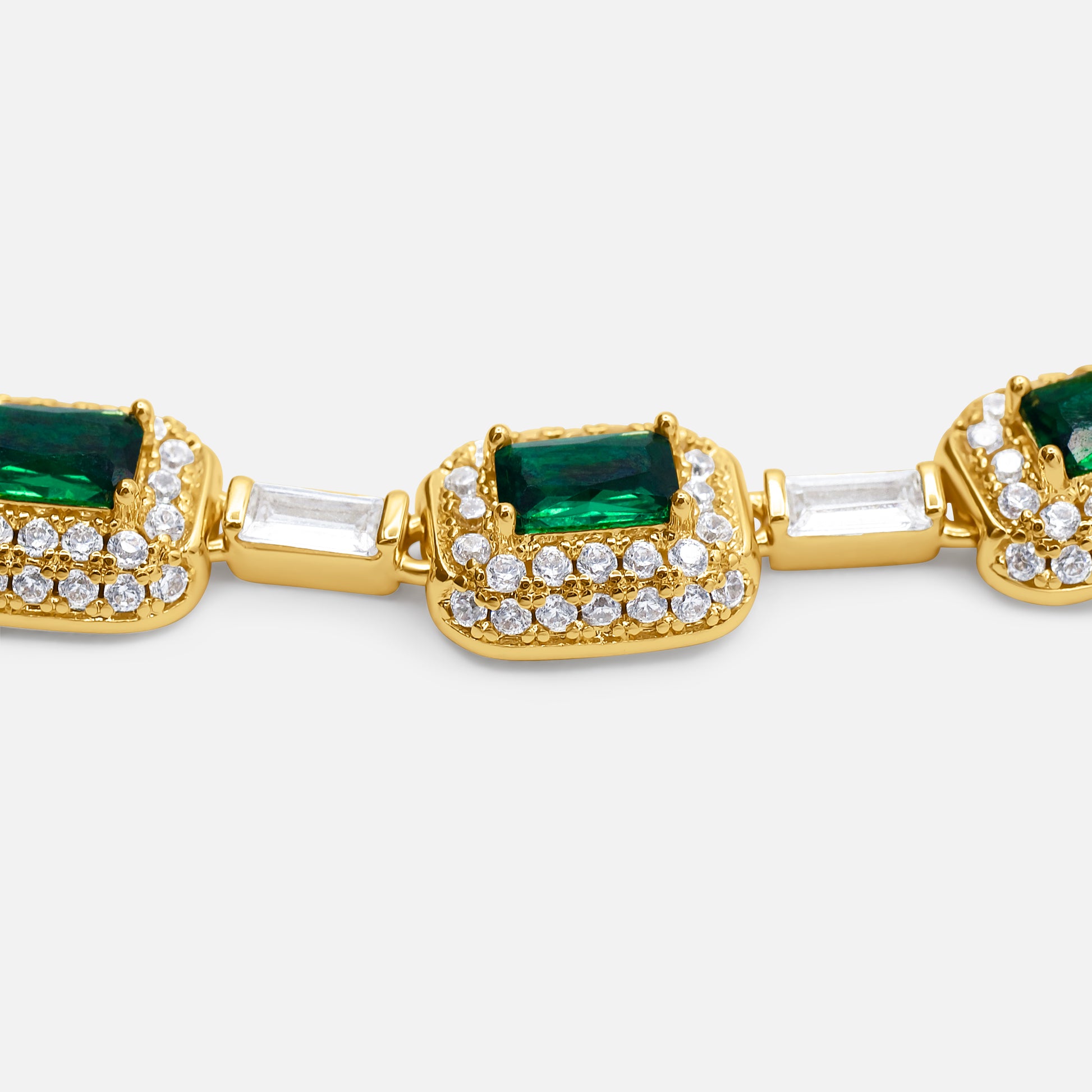 Gold bracelet with emerald and diamond accents on a white background - Verdeza Bracelet - JCollins Jewelry