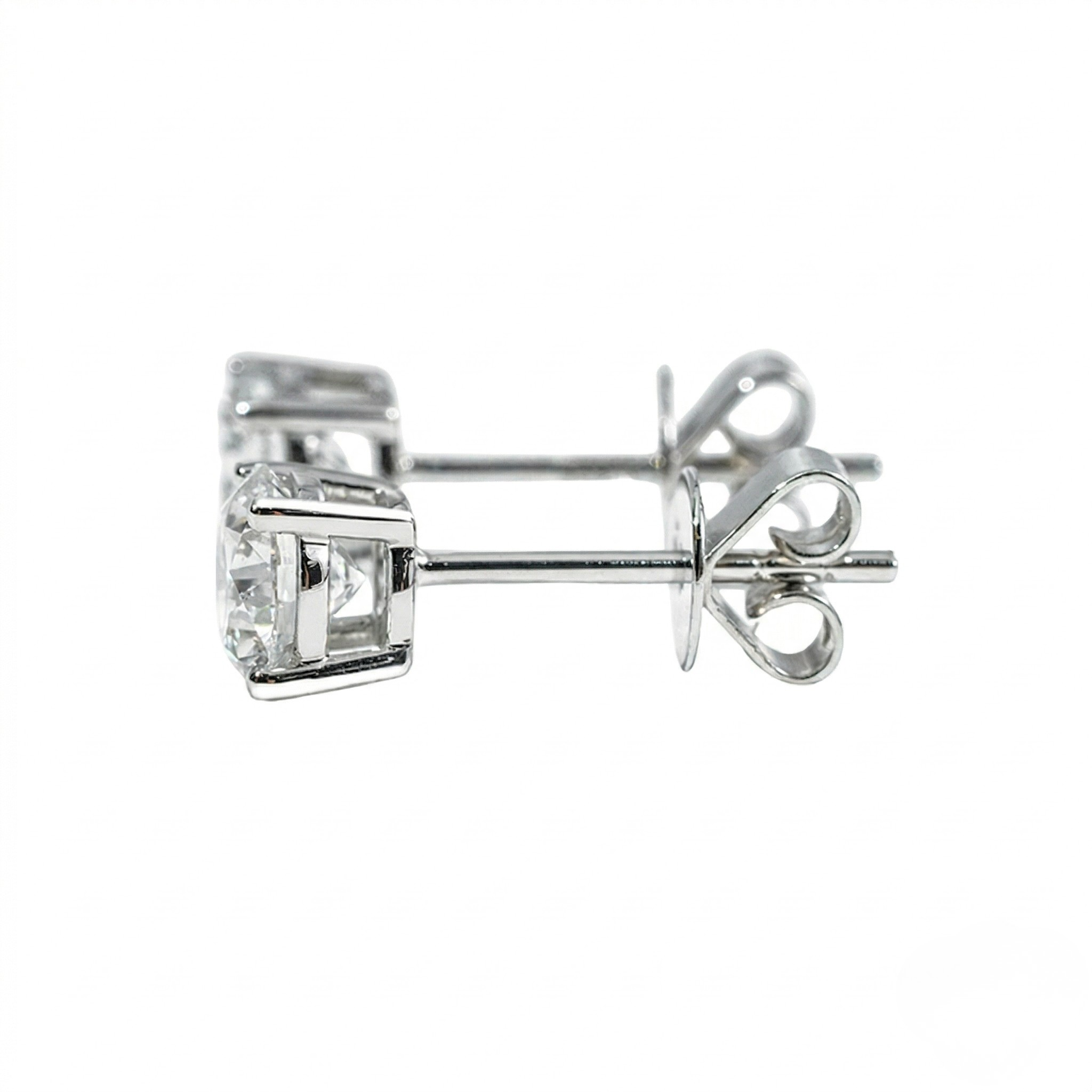 Silver stud earrings with a clear gemstone on a white background. - White Gold Diamond Earrings - J. Collins Jewelry 