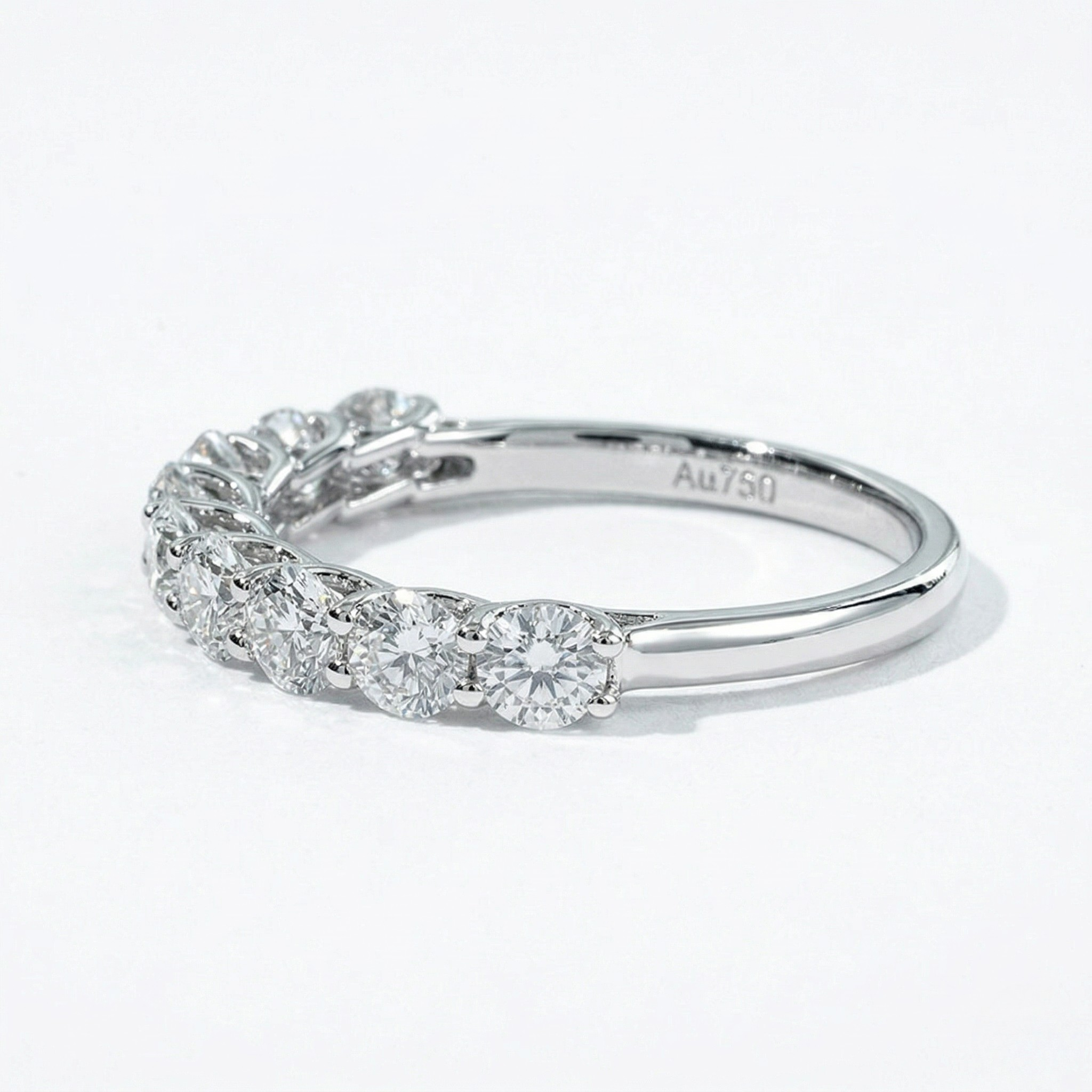 18K white gold ring with seven lab-grown princess-cut diamonds totaling 0.9ct in a sleek band design