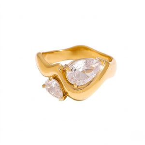 Gold ring with twin pear-shaped gemstones in a curved band design
